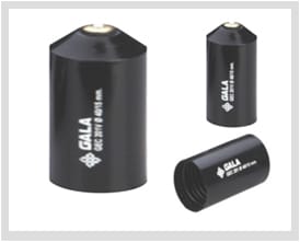 Three black moulded heat-shrink end caps of different diameters on a white background, each printed with a GALA mark and its GEC size code, the tallest carrying a small brass valve at the crown.
