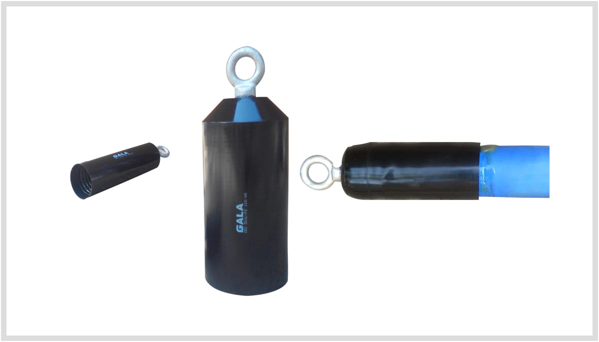 Black heat-shrink end caps with a galvanised steel eye bolt set into the closed end, shown loose and again shrunk down onto a blue cable.